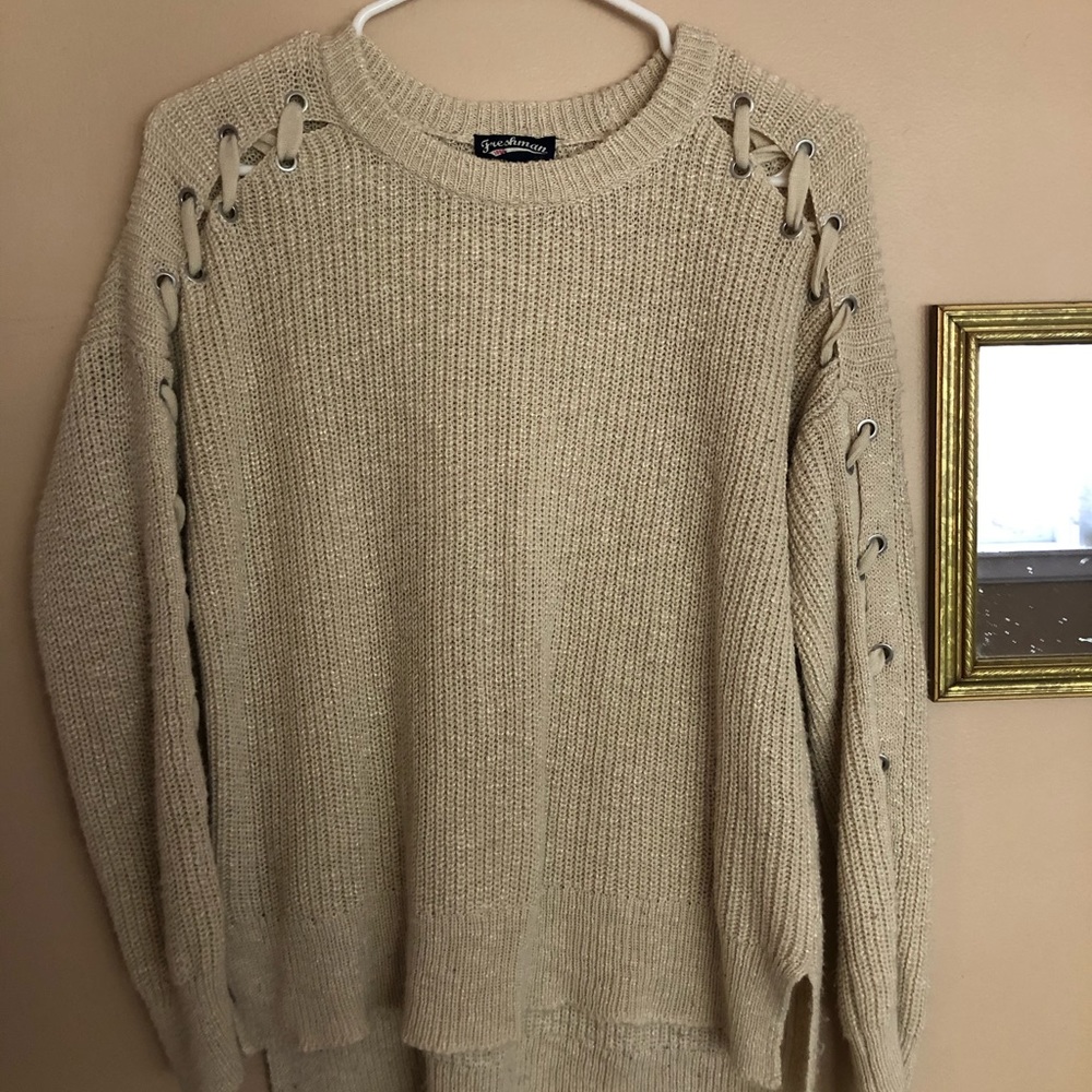 Tan sweater with tie sleeves
